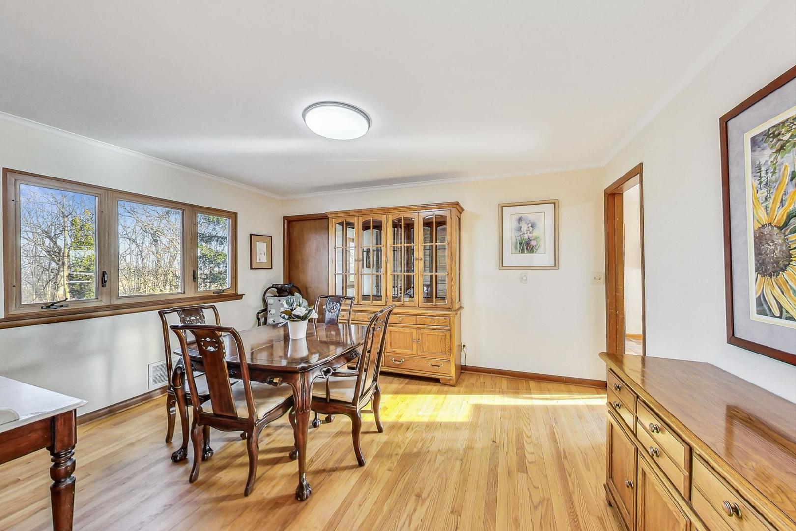 3316 Millstream Road Marengo, IL 60152 - Photo 8 of 62 a view of a dining room with furniture and wooden floor