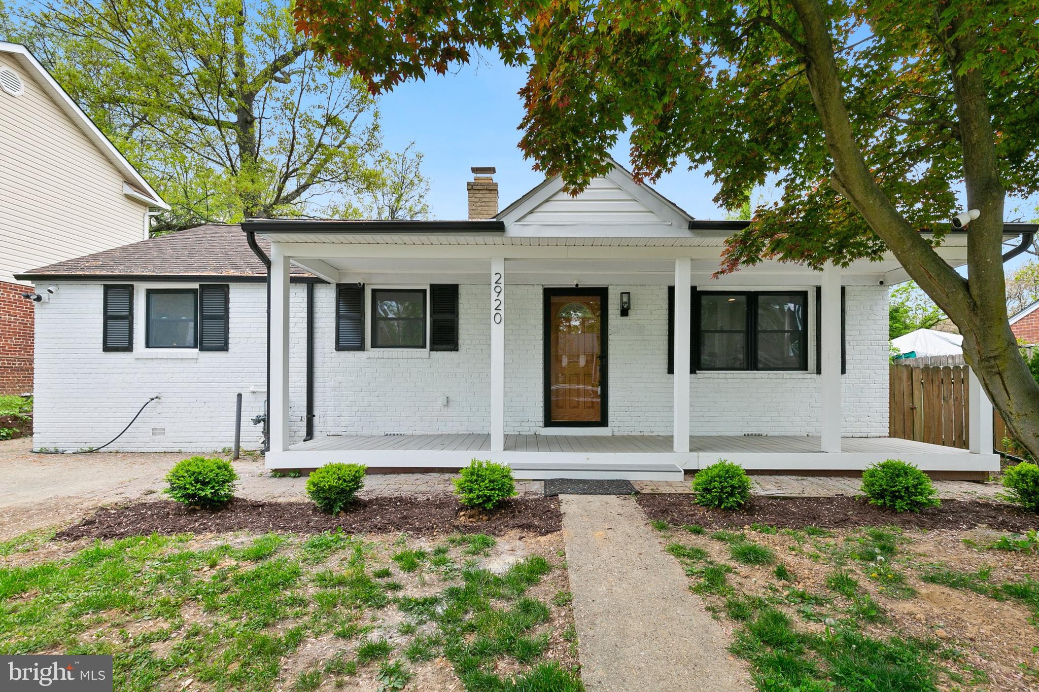 2920 Weisman Road Silver Spring, MD 20902 - Photo 1 of 32 a front view of a house with garden