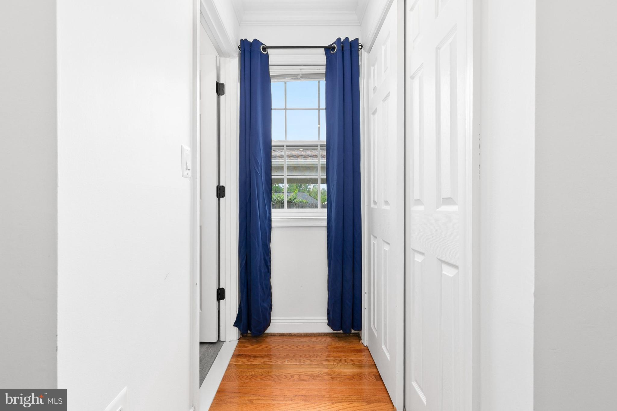 2920 Weisman Road Silver Spring, MD 20902 - Photo 23 of 32 a view of a hallway with wooden floor