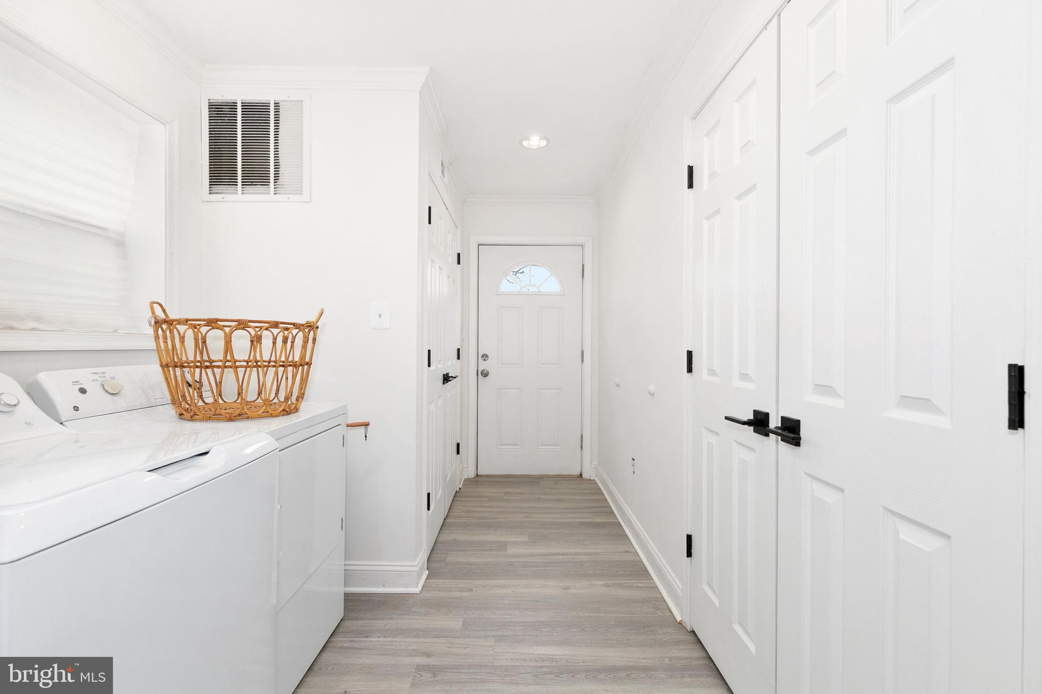 2920 Weisman Road Silver Spring, MD 20902 - Photo 25 of 32 a view of a hallway with wooden cabinets