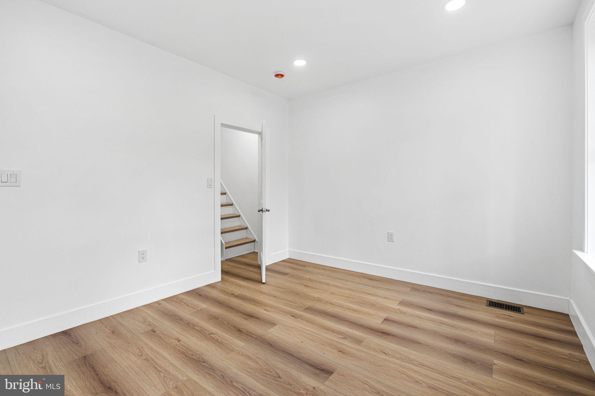 908 Reed Street Philadelphia, PA 19147 - Photo 18 of 33 a view of empty room with wooden floor