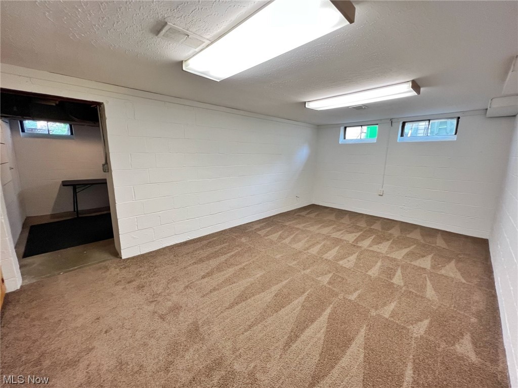 4605 Birchwold Road South Euclid, OH 44121 - Photo 12 of 30 Partially finished basement area.