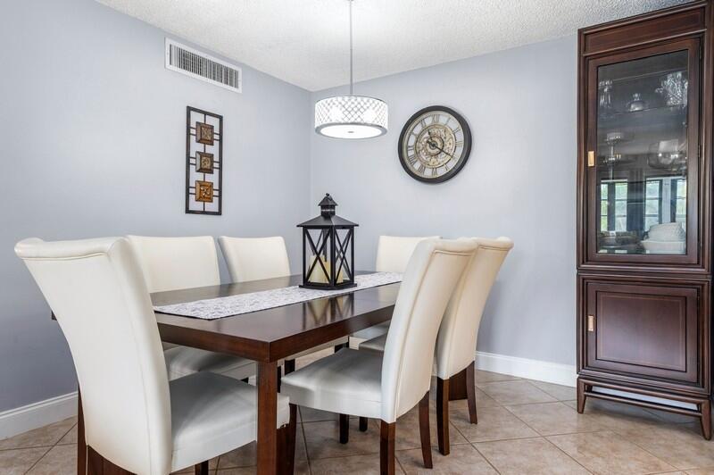 509 Dotterel Road, Unit 23C Delray Beach, FL 33444 - Photo 6 of 15 07_509DotterelRd_Apt23C_2_DiningRoom_Fle