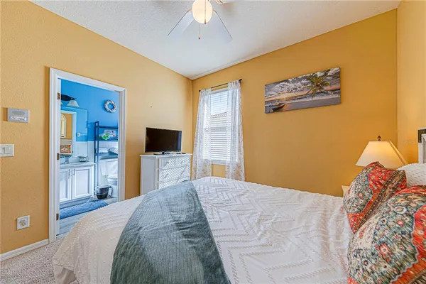 a spacious bathroom with a sink a toilet and shower