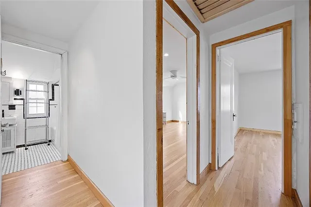 a view of a bedroom from a hallway