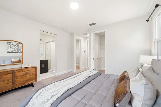 a bathroom with a sink vanity and a mirror
