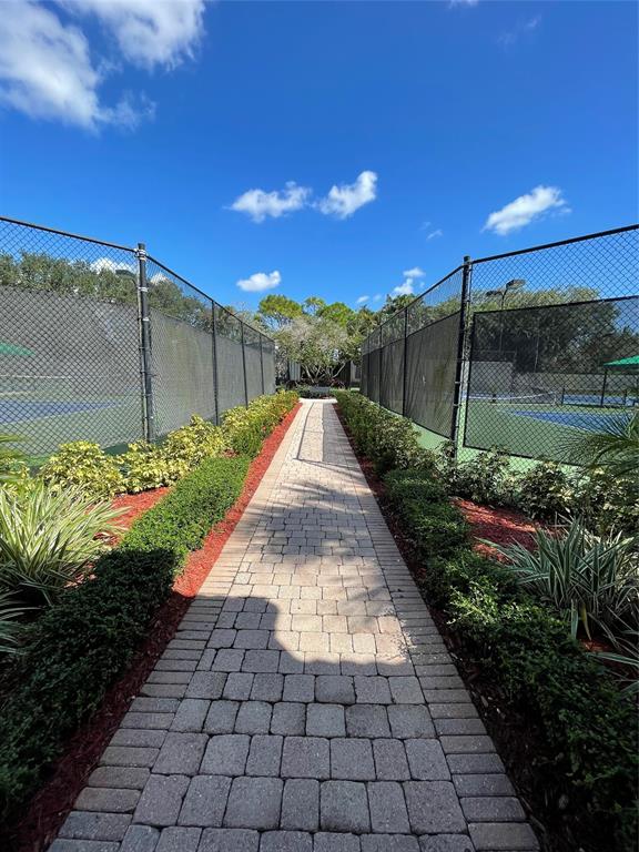 3462 Dovecote Meadow Lane Davie, FL 33328 - Photo 25 of 40 a view of a pathway with a backyard