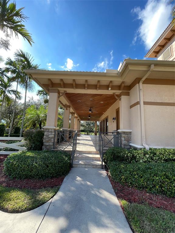 3462 Dovecote Meadow Lane Davie, FL 33328 - Photo 26 of 40 a view of a porch