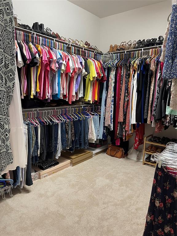 3462 Dovecote Meadow Lane Davie, FL 33328 - Photo 32 of 40 a view of walk in closet with clothes