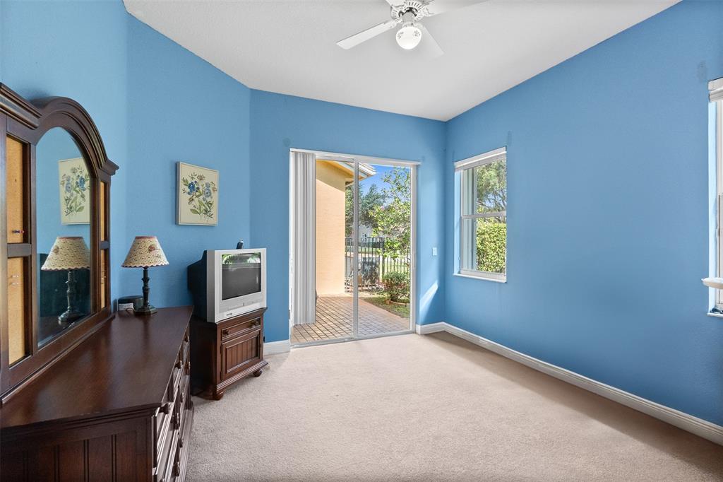 3462 Dovecote Meadow Lane Davie, FL 33328 - Photo 38 of 40 a view of a livingroom with furniture and a window