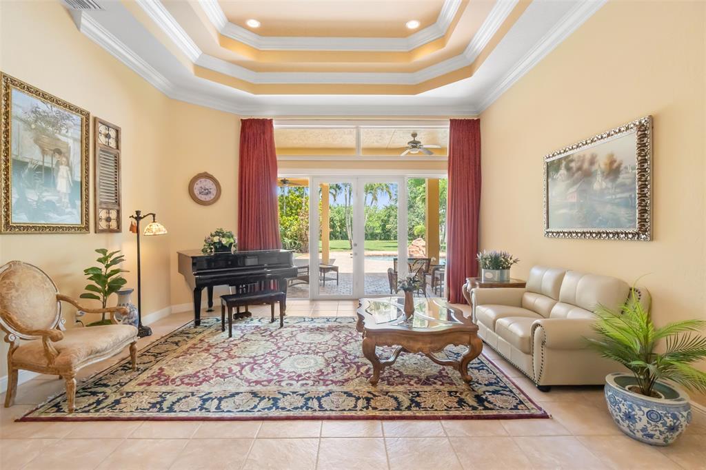 3462 Dovecote Meadow Lane Davie, FL 33328 - Photo 9 of 40 a living room with furniture and a large window