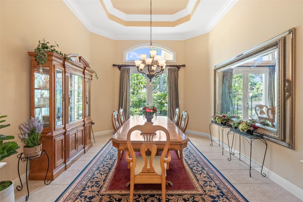 3462 Dovecote Meadow Lane Davie, FL 33328 - Photo 10 of 40 a view of a dining room with furniture window and wooden floor