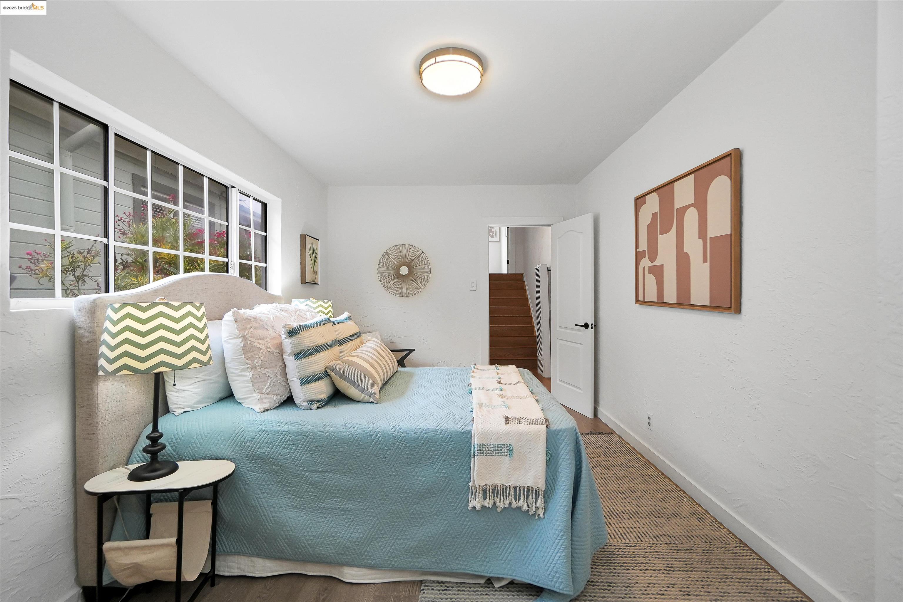 3911 Vale Avenue Oakland, CA 94619 - Photo 26 of 45 a bedroom with furniture and a window