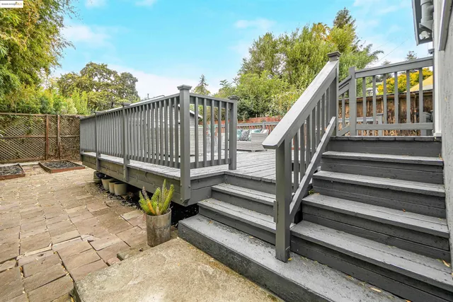 a view of a bench in wooden floor