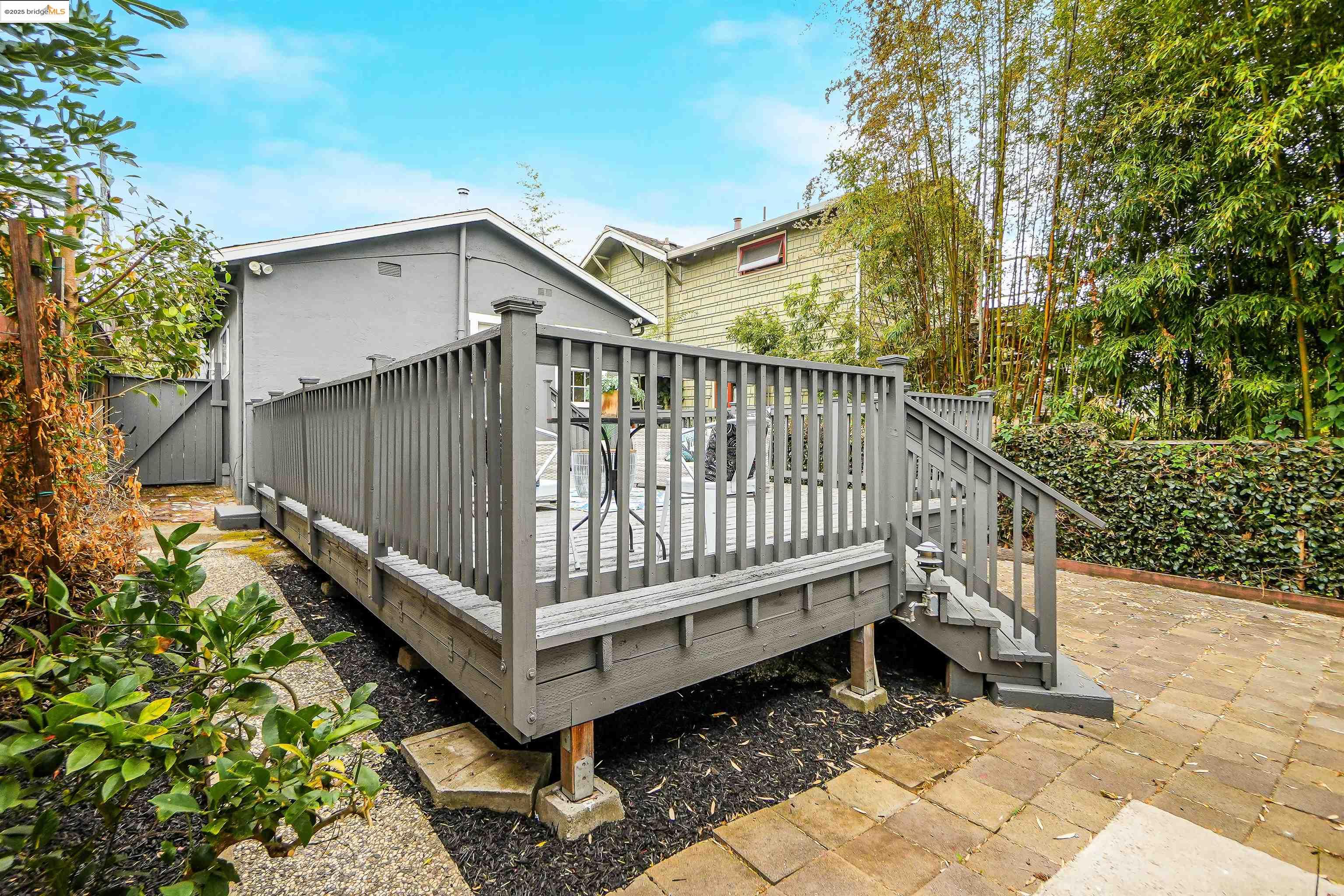 3911 Vale Avenue Oakland, CA 94619 - Photo 39 of 45 a view of a house with a yard and deck