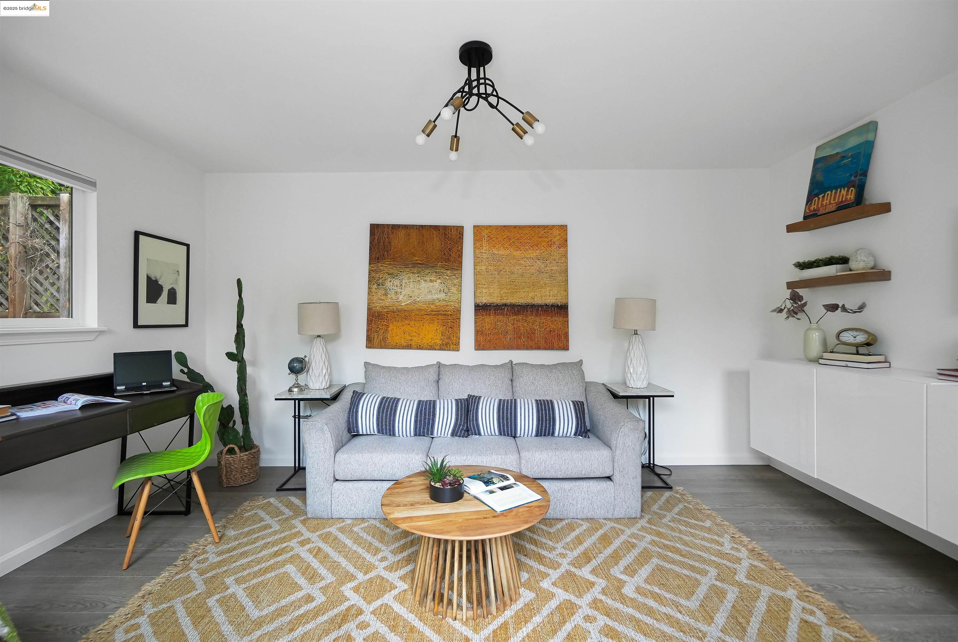 3911 Vale Avenue Oakland, CA 94619 - Photo 41 of 45 a living room with furniture and a window