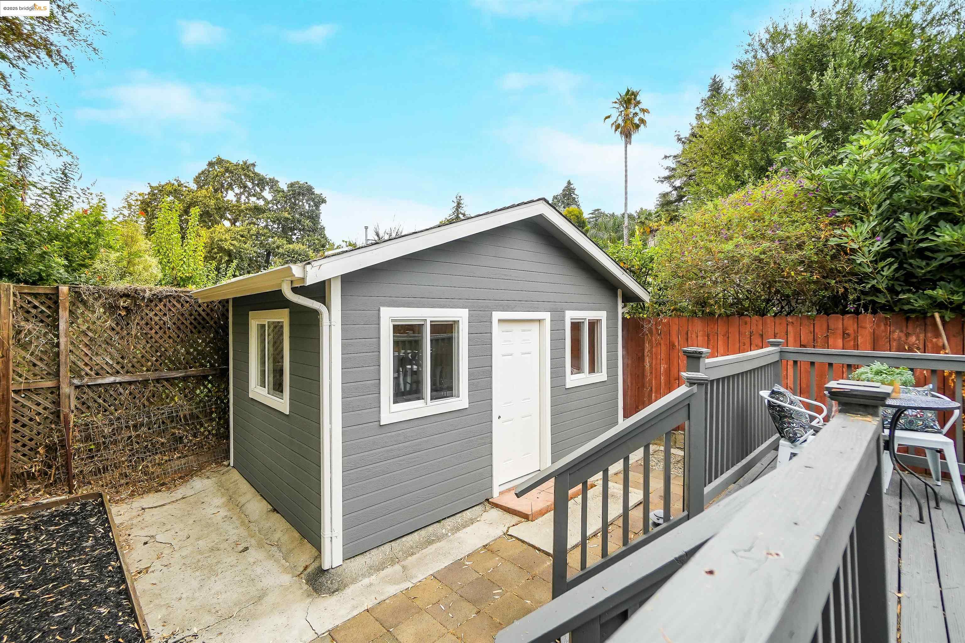 3911 Vale Avenue Oakland, CA 94619 - Photo 7 of 45 a view of a house with a yard