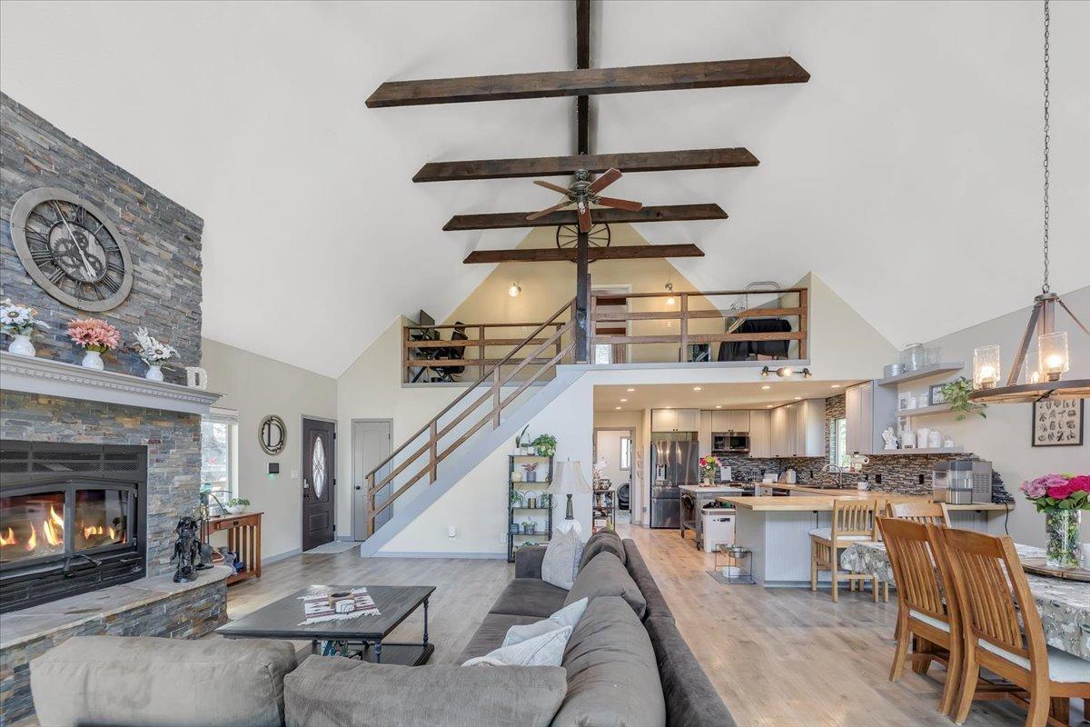 1499 Sawmill Road, Unit 594 Copperopolis, CA 95228 - Photo 19 of 98 a living room with lots of furniture and a fireplace
