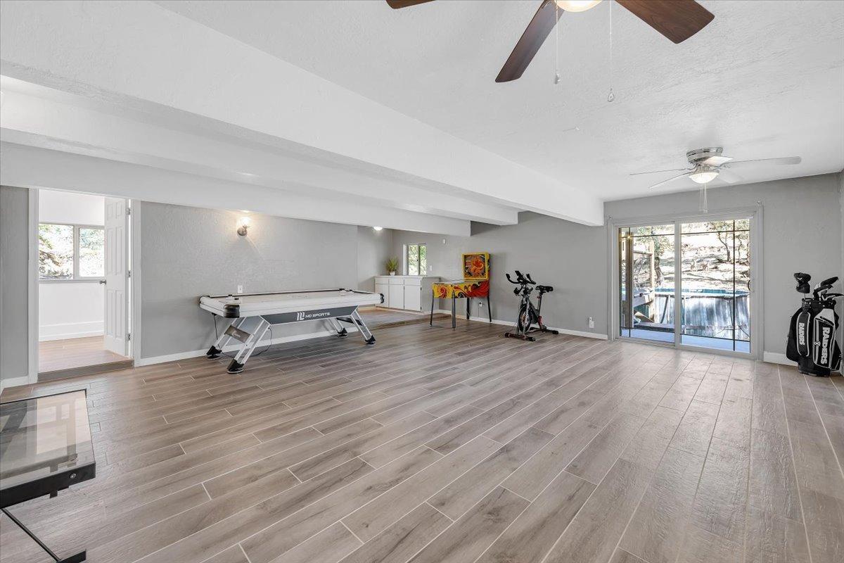 1499 Sawmill Road, Unit 594 Copperopolis, CA 95228 - Photo 48 of 98 a view of a room with gym equipment and a window