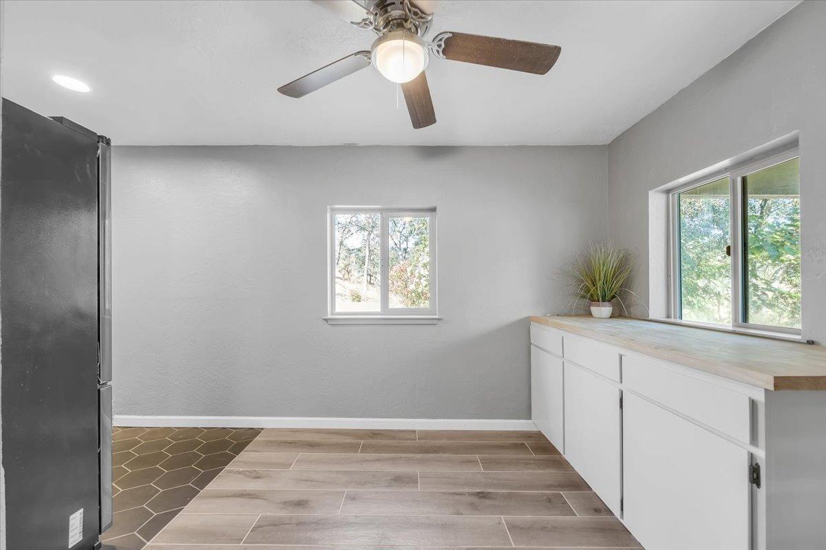 1499 Sawmill Road, Unit 594 Copperopolis, CA 95228 - Photo 52 of 98 a view of an empty room with window and wooden floor