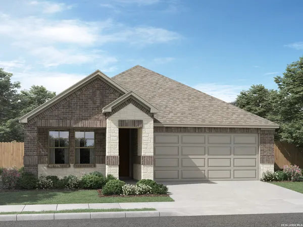 a front view of a house with a garage