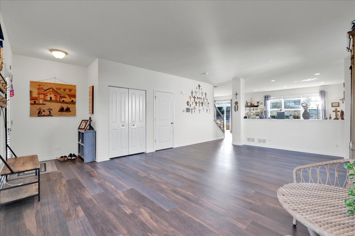 435 Fawn Lane Oswego, IL 60543 - Photo 19 of 47 a view of a livingroom with furniture and hardwood floor