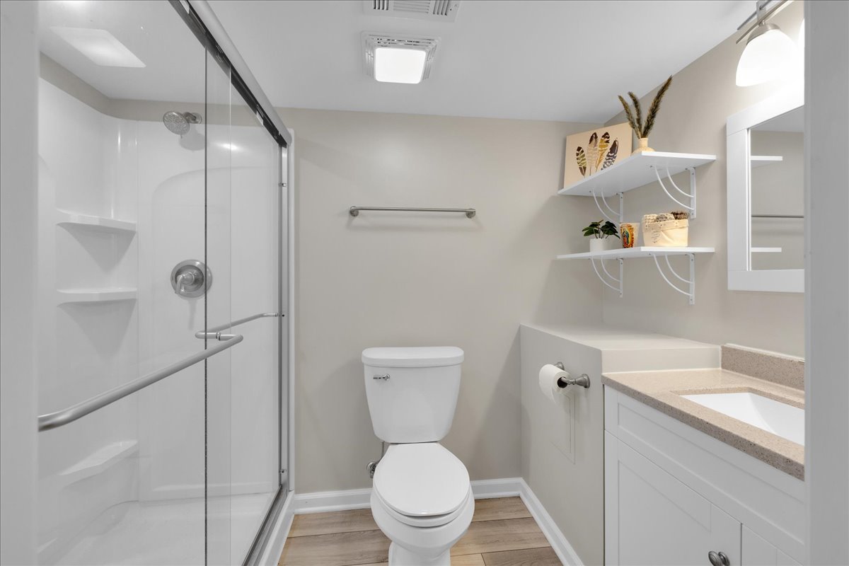 435 Fawn Lane Oswego, IL 60543 - Photo 38 of 47 a bathroom with a granite countertop sink toilet and shower