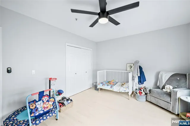 a bedroom with furniture and a bed