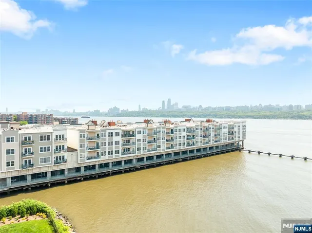 a view of a swimming pool with an ocean view