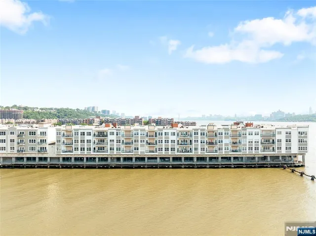 a view of a ocean with a large building