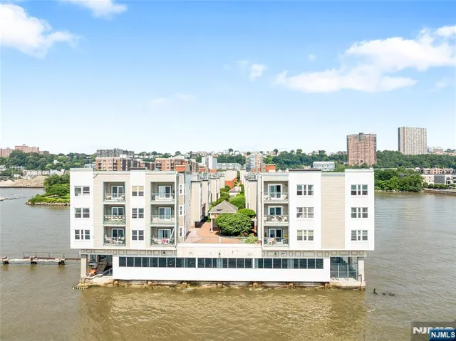 a large building with a large pool