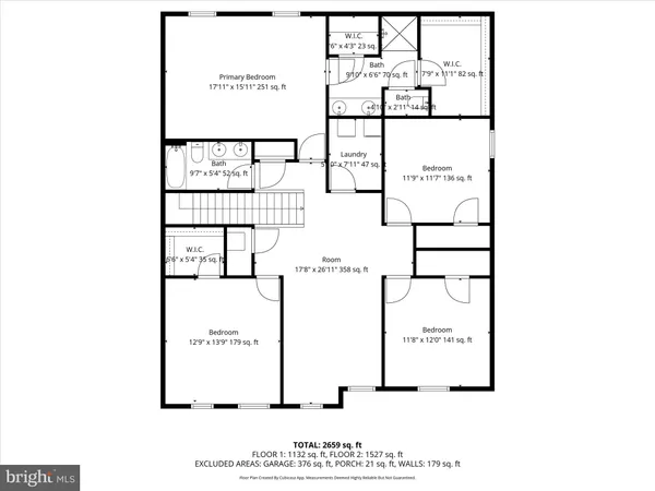 a living room with furniture or outdoor dining space and a chandelier