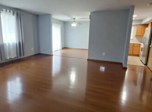 a view of livingroom with furniture and wooden floor