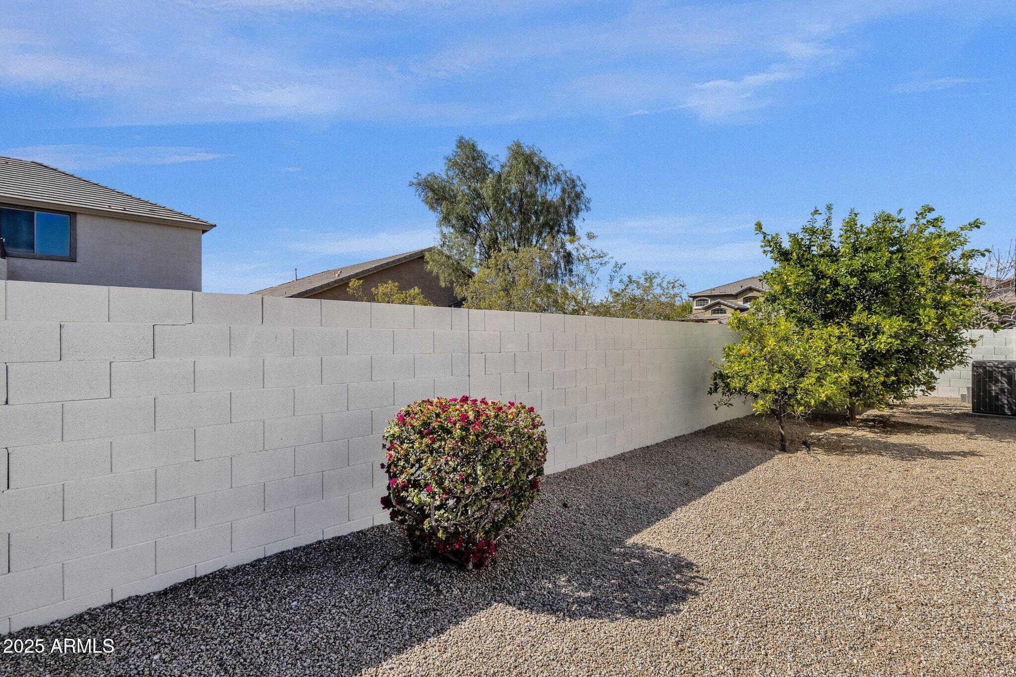 2417 West Apache Rain Road Phoenix, AZ 85085 - Photo 36 of 41 a view of a wooden fence