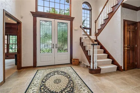a view of an entryway with staircase