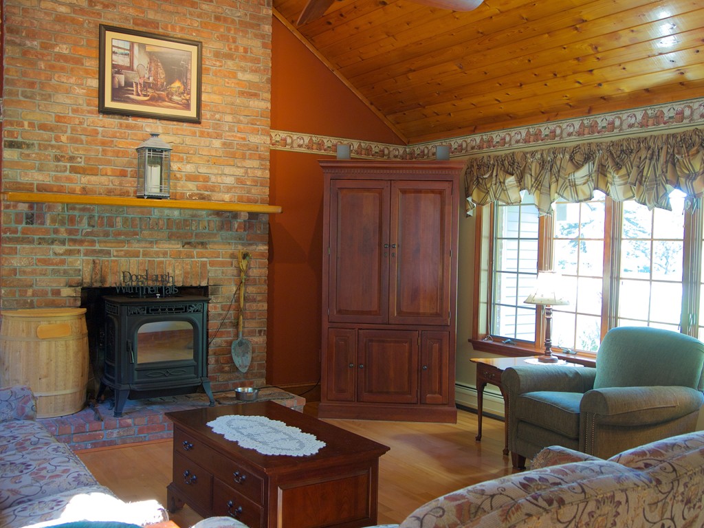 127 Town Farm Road Monson, MA 01057 - Photo 3 of 27 a living room with furniture and a fireplace