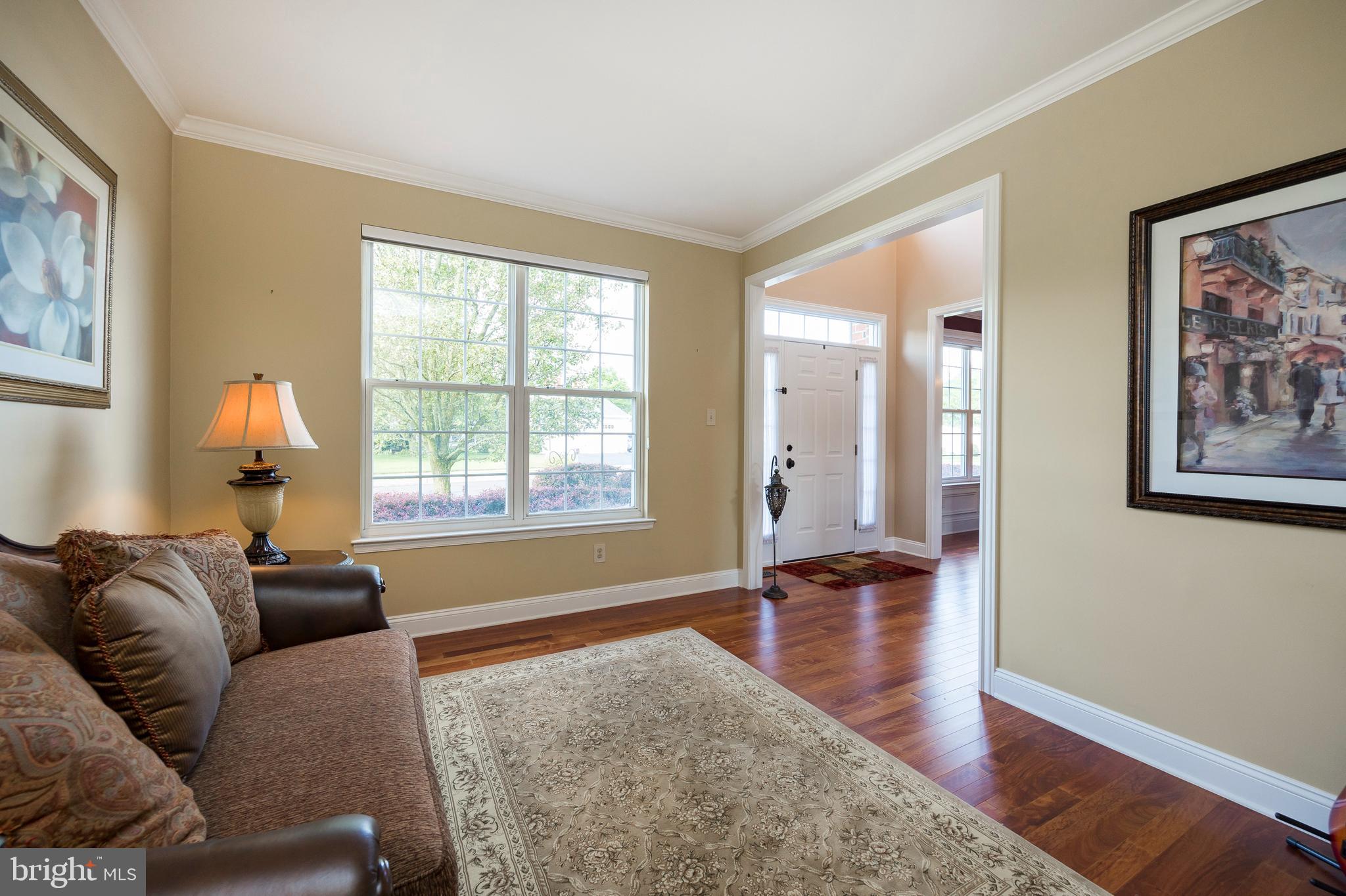 303 Doe Run Road Harleysville, PA 19438 - Photo 10 of 61 Living room with crown molding