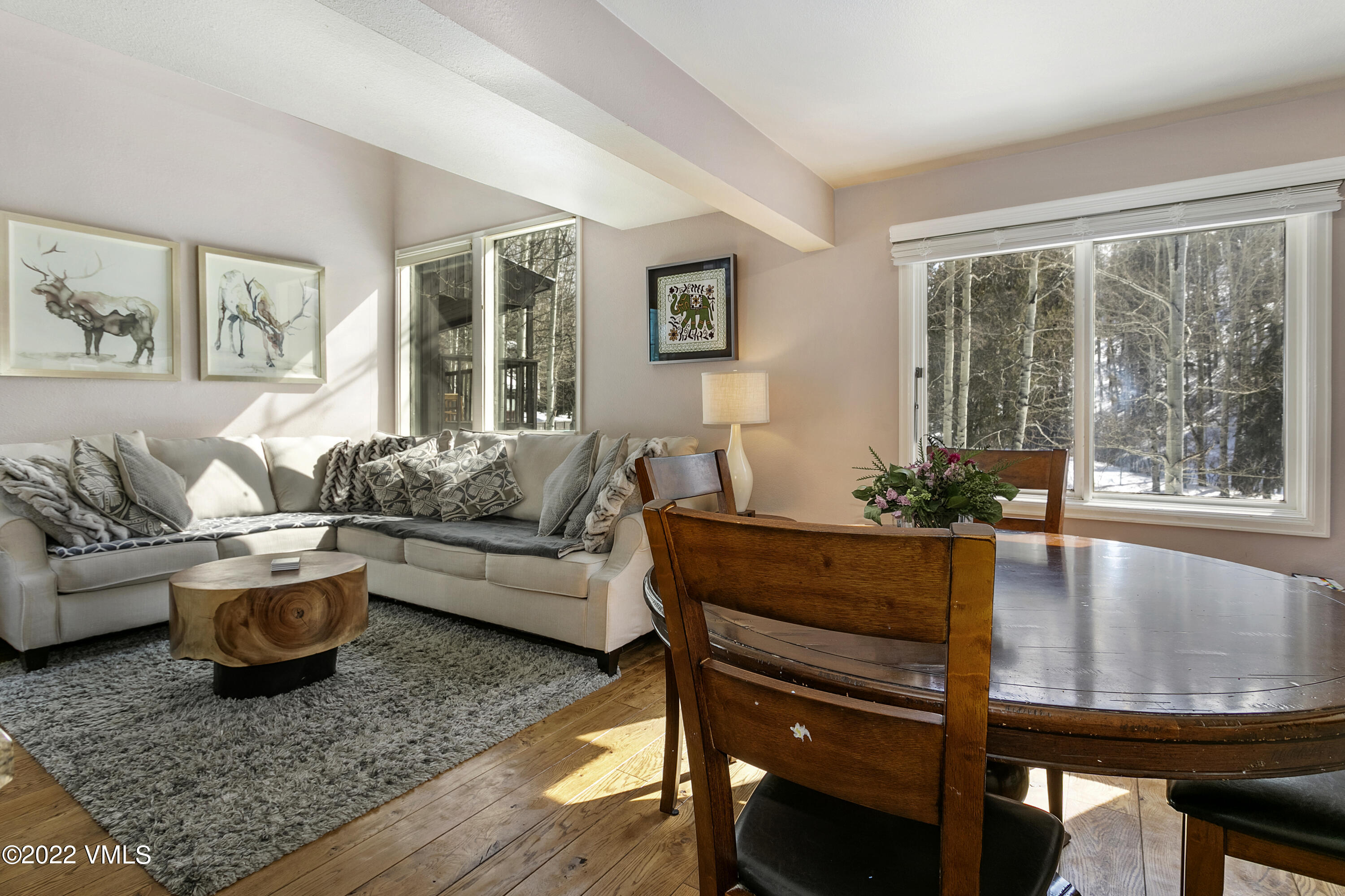 1614 Buffehr Creek Road, Unit A19 Vail, CO 81657 - Photo 5 of 23 a living room with furniture and a window
