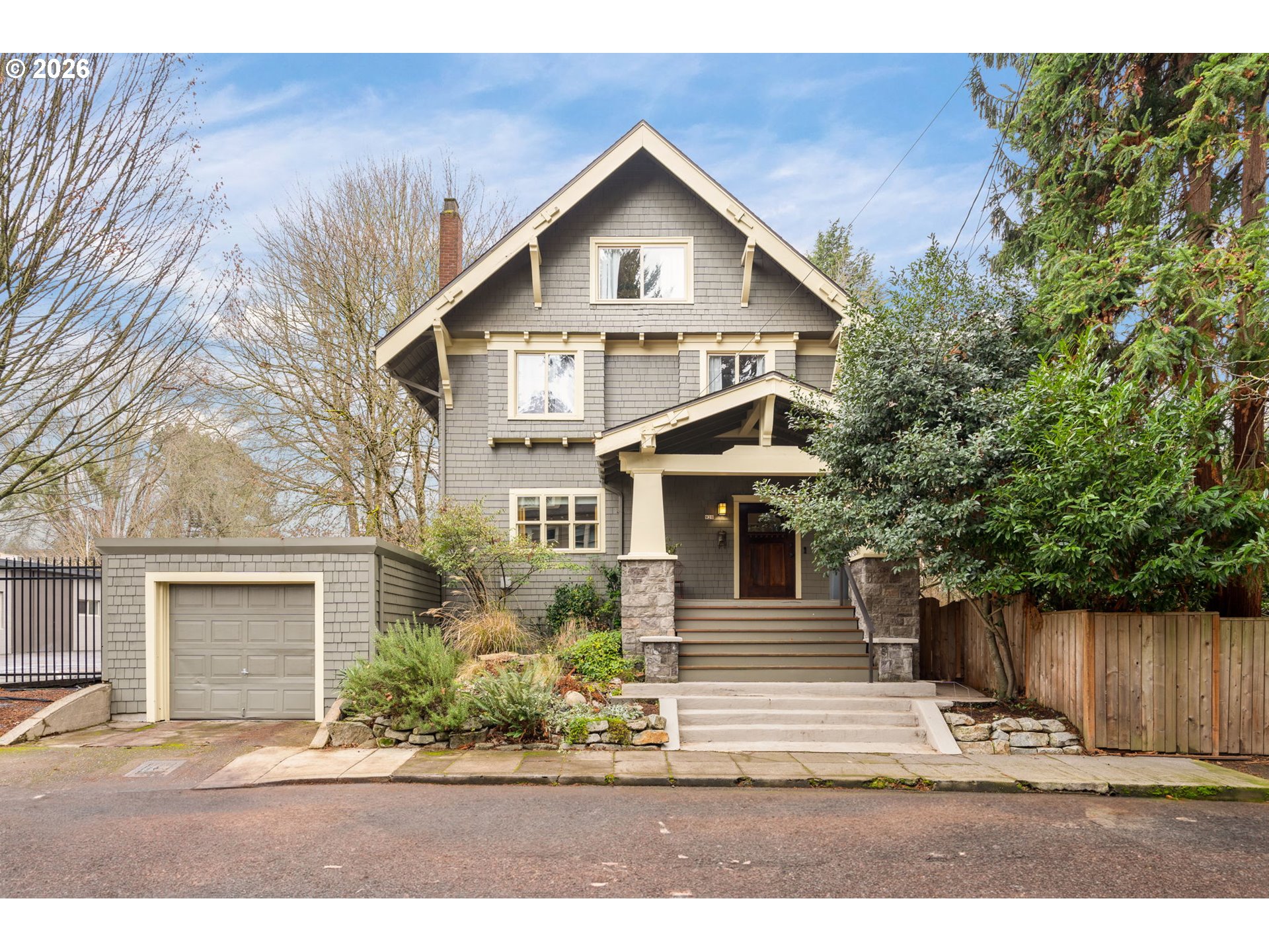 928 Southeast 18th Avenue Portland, OR 97214 - Photo 1 of 47 a front view of a house with a yard