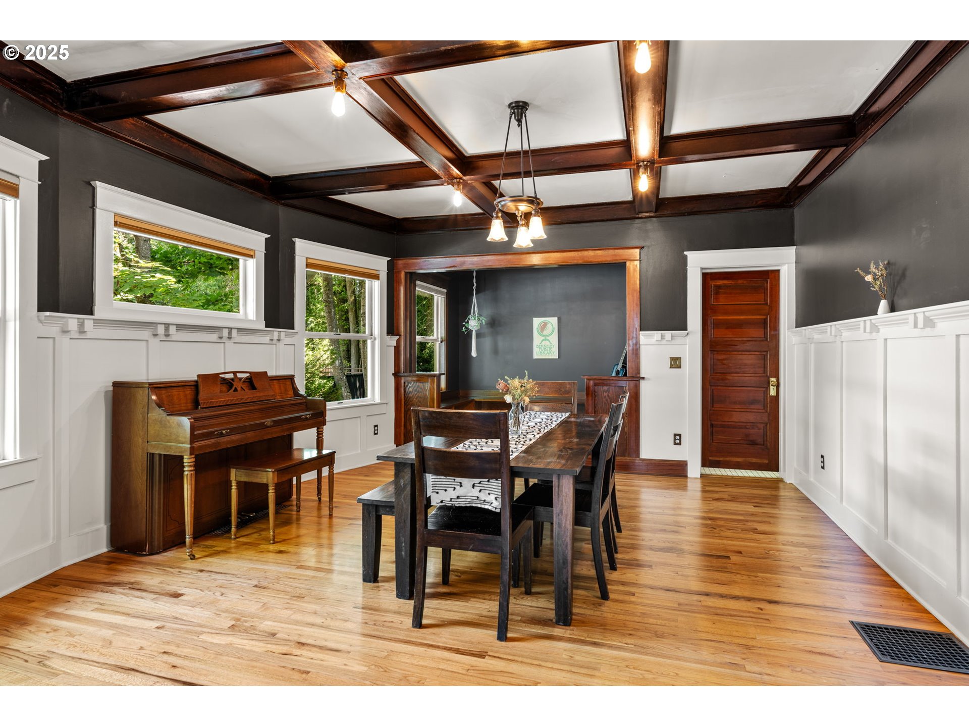 928 Southeast 18th Avenue Portland, OR 97214 - Photo 11 of 47 a dining room with furniture and wooden floor