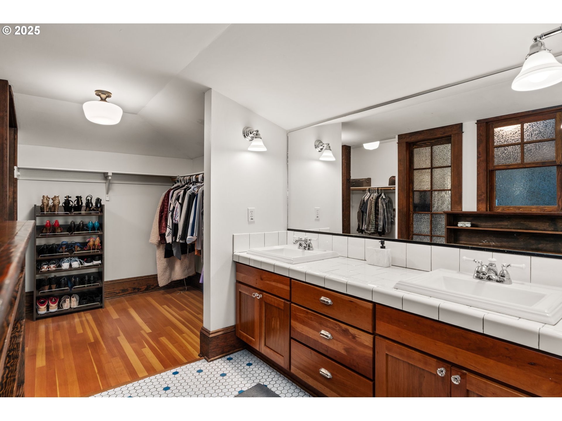 928 Southeast 18th Avenue Portland, OR 97214 - Photo 22 of 47 a bathroom with a sink and a mirror