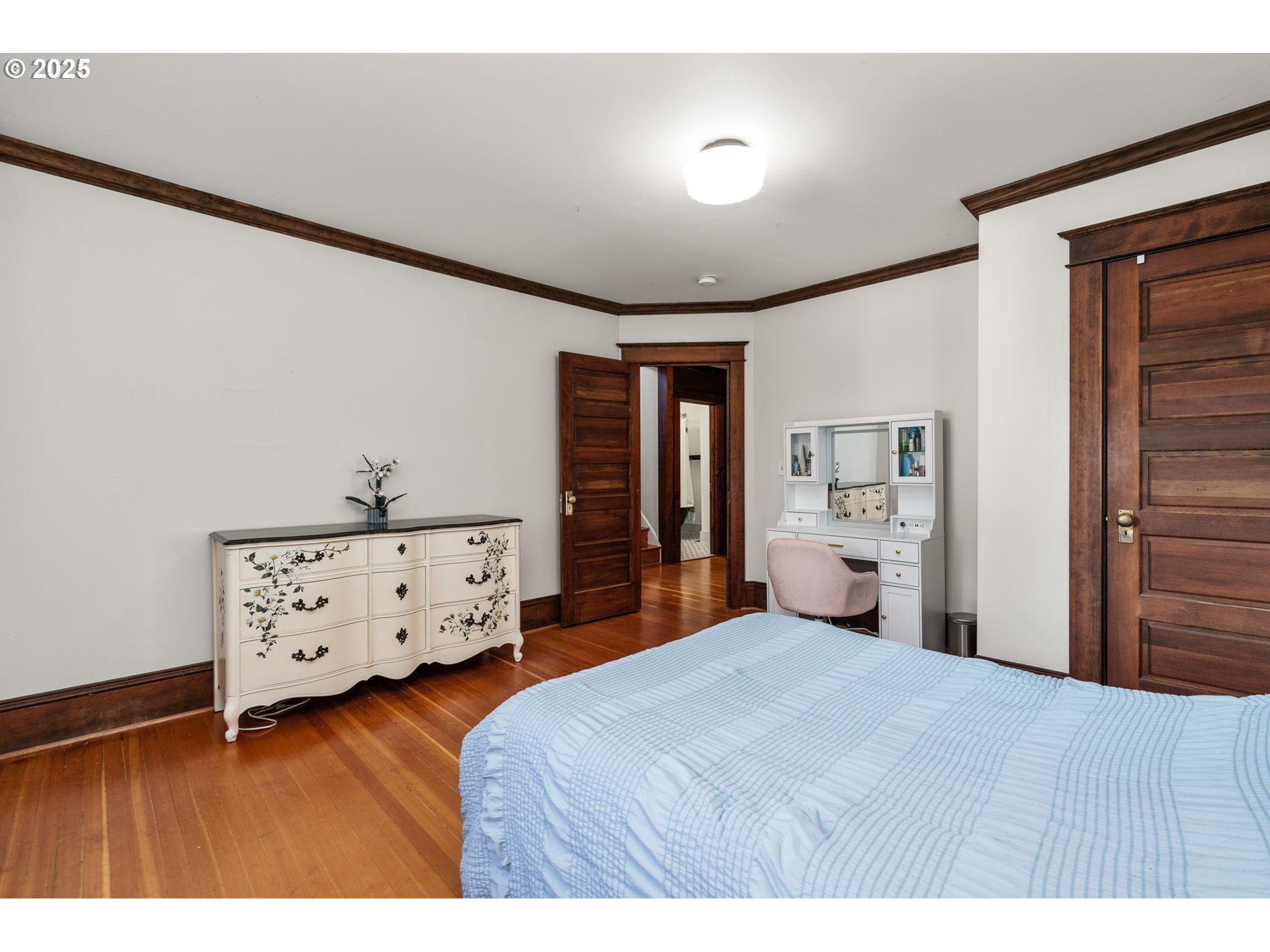 928 Southeast 18th Avenue Portland, OR 97214 - Photo 25 of 47 a bedroom with a bed and a closet