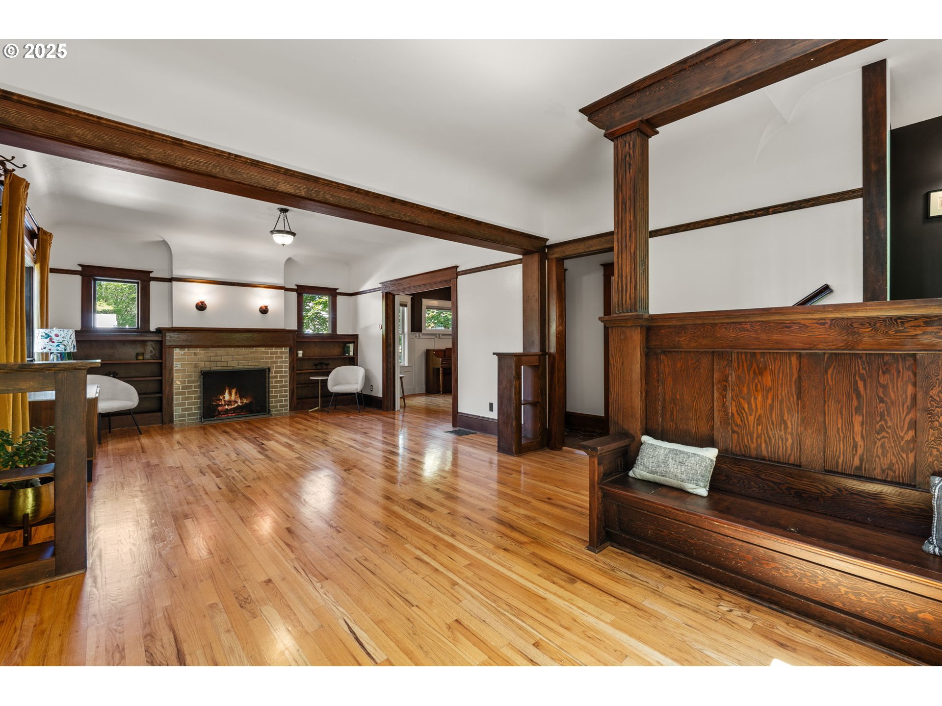 928 Southeast 18th Avenue Portland, OR 97214 - Photo 6 of 47 a living room with furniture and a fireplace