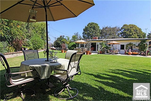2157 Rural Place Costa Mesa, CA 92627 - Photo 1 of 1 One more view of Home and Yard from S corner of Yard.