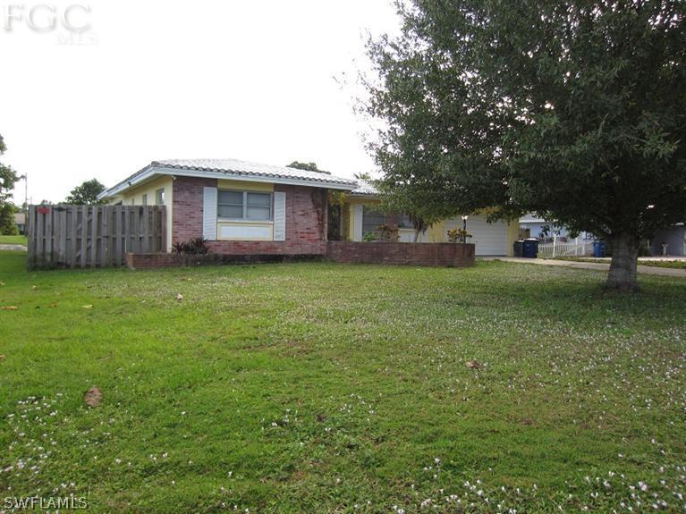 6197 Park Road Fort Myers, FL 33908 - Photo 1 of 11 a view of a yard in front of house