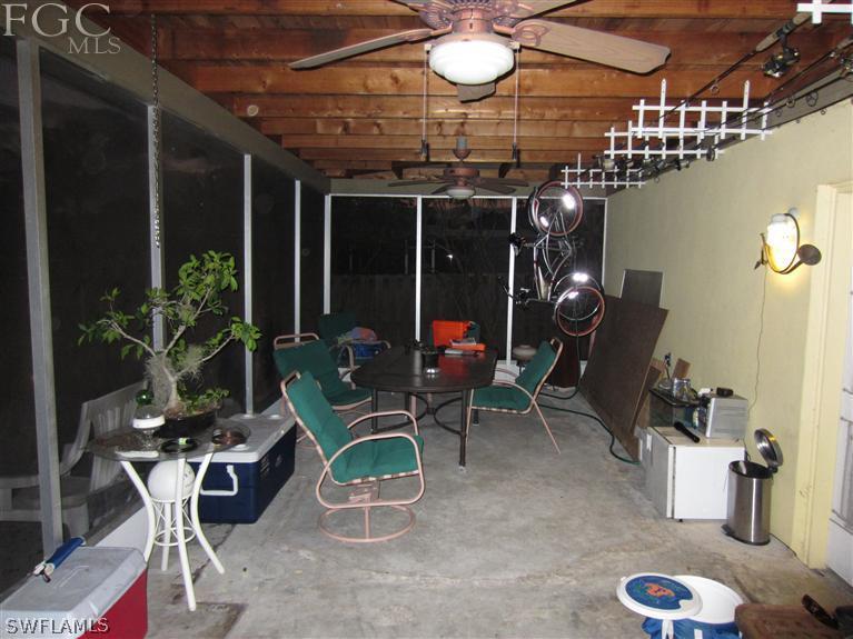 6197 Park Road Fort Myers, FL 33908 - Photo 10 of 11 a view of a chairs and tables in patio