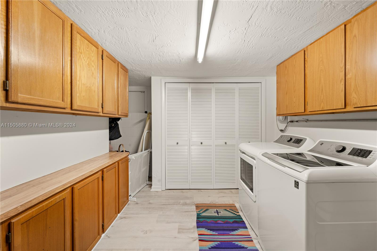 8636 Southwest 94th Street Miami, FL 33156 - Photo 23 of 29 a room with storage and utility