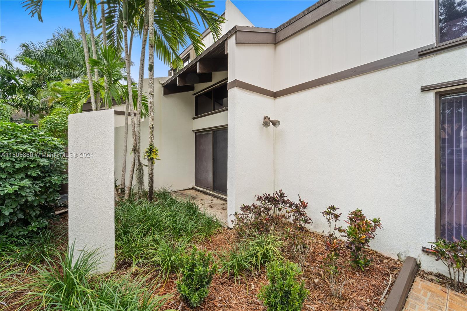 8636 Southwest 94th Street Miami, FL 33156 - Photo 3 of 29 a view of a house with a small yard