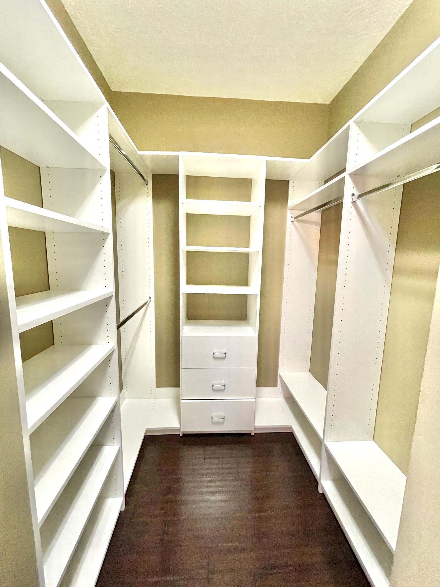 8550 Vía Romana, Unit 2 Boca Raton, FL 33496 - Photo 15 of 28 a view of an empty walk in closet