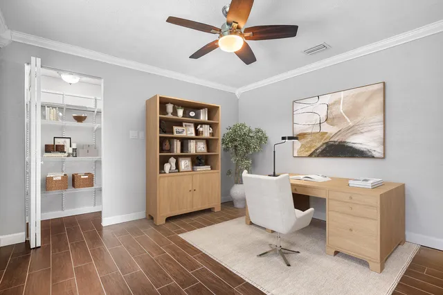 a view of swimming pool with chairs in patio